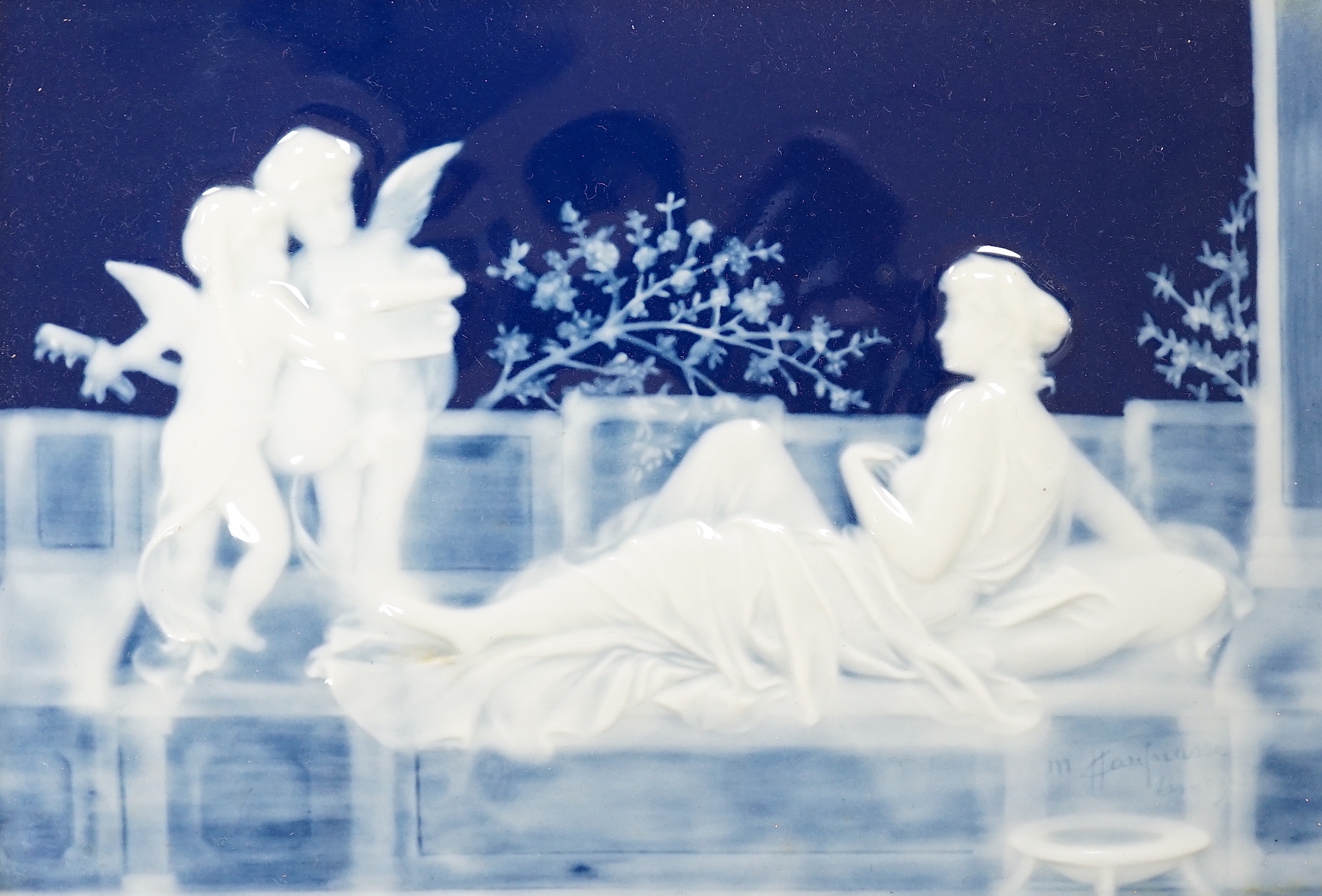 A framed pate sur pate panel, signed Chaufriase, recumbent female, Limoges, 20.5cm x 15cm